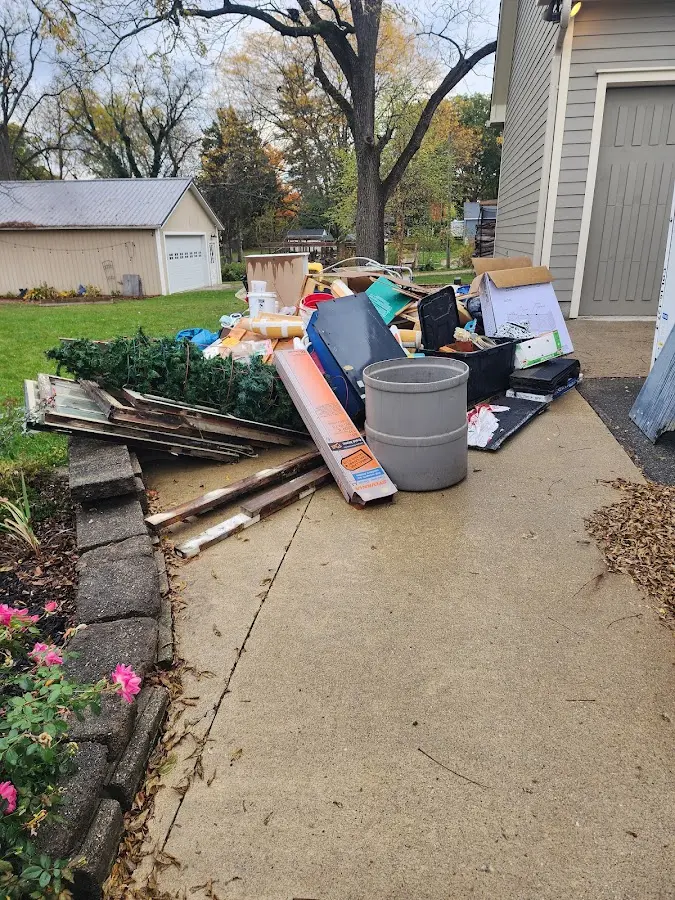 Dumpster being loaded with debris for Residential Dumpster Rental in Oregon